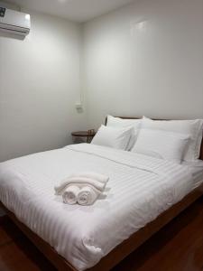 Postel nebo postele na pokoji v ubytování Ama'home