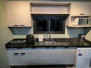 Η κουζίνα ή μικρή κουζίνα στο Casa Container Pôr do Sol