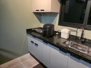 Η κουζίνα ή μικρή κουζίνα στο Casa Container Pôr do Sol