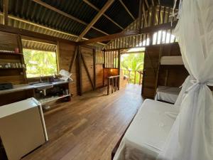 Postel nebo postele na pokoji v ubytování Cabañas Arrecifes