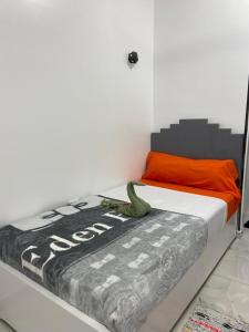 Postel nebo postele na pokoji v ubytování OBAI Nubian Guest House