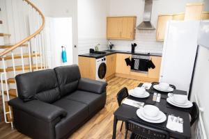 Kuchyň nebo kuchyňský kout v ubytování Luton Grove