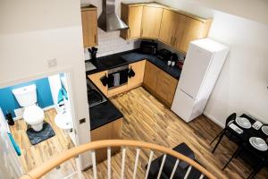 Kuchyň nebo kuchyňský kout v ubytování Luton Grove + 4 fotografie