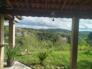 a view from the porch of a house at Chácara Condomínio Cristal Azul Mairinque in Mairinque