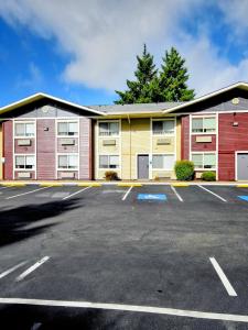a parking lot in front of a building at Quality Inn & Suites Wilsonville in Wilsonville