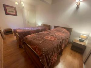 Postel nebo postele na pokoji v ubytování Appartement cosy à Pra-Loup, 6 pers, terrasse et parking réservé - FR-1-165A-206