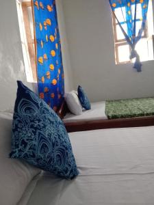 Postel nebo postele na pokoji v ubytování lalala salama