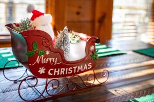 a christmas figurine of a santa claus at Near Dollywood with Pool Table-Hot Tub-Fire Pit-Game Room in Pigeon Forge