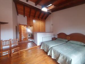 Postel nebo postele na pokoji v ubytování Cielos de Celadas