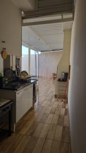 Kuchyň nebo kuchyňský kout v ubytování Casa de Temporada Piumhi