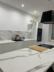 Kuchyň nebo kuchyňský kout v ubytování Chambre Élégance et confort a Esch