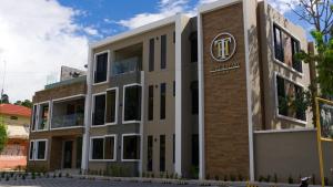 a rendering of the front of a building at Hotel Tiffany in Flores