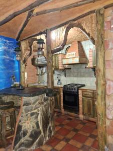 MéridaにあるApartamento Caribayのキッチン(コンロ付)