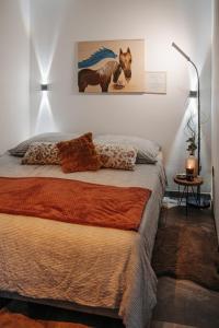 Postel nebo postele na pokoji v ubytování Heavens Embrace - ateliér pri Slovenskom raji