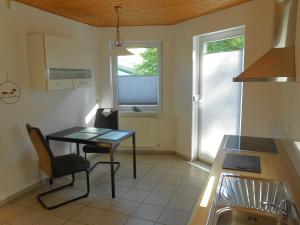 Kuchyň nebo kuchyňský kout v ubytování Ferienwohnung Im Tal Olsberg