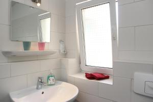 Koupelna v ubytování Ferienwohnung Im Tal Olsberg + 8 fotografií