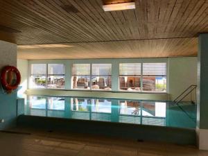 Bazén v ubytování Wohnung Mit Herrlichem Blick Auf Den Pilatus nebo v jeho okolí + 6 fotografií