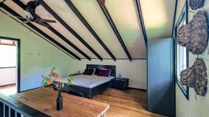 Postel nebo postele na pokoji v ubytování Six Pillars Resort