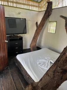 Postel nebo postele na pokoji v ubytování Villa Gabriela casa campestre + 7 fotografií