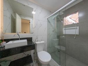 Koupelna v ubytování Apto a poucos metros do mar + 12 fotografií