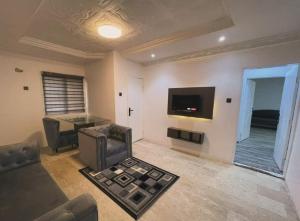 TV a/nebo společenská místnost v ubytování IlewaLekkiLagos