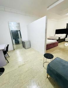 Postel nebo postele na pokoji v ubytování IlewaLekkiLagos