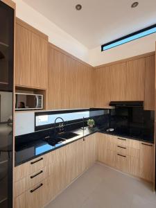 Kuchyň nebo kuchyňský kout v ubytování Modern beach house in San Carlos + 37 fotografií