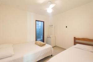 Postel nebo postele na pokoji v ubytování HOSTEL DIKASA