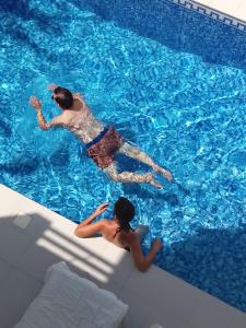 Bazén v ubytování Villa keur Baye fall nebo v jeho okolí + 4 fotografie