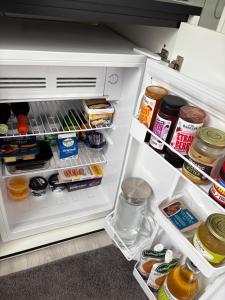 Kuchyň nebo kuchyňský kout v ubytování Petite on Regent