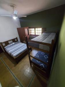 Ένα ή περισσότερα κρεβάτια σε δωμάτιο στο Rincon de la Selva +21 φωτογραφίες