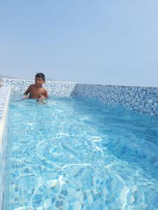 Bazén v ubytování Hospedaje Kaihalulu nebo v jeho okolí