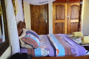 Voodi või voodid majutusasutuse EKO Holiday Homes, Lake Chala toas