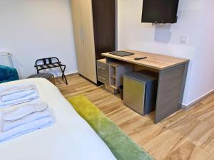 Ένα ή περισσότερα κρεβάτια σε δωμάτιο στο Byzanthin rooms