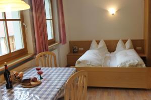 Postel nebo postele na pokoji v ubytování Gemütliche Ferienwohnung Für Zwei Personen