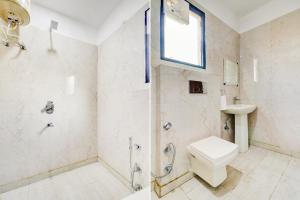 Ένα μπάνιο στο Hotel O Ratan Pacific Hotel And Party Hall