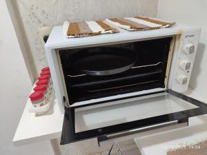 Η κουζίνα ή μικρή κουζίνα στο Acogedor departamento en excelente ubicación ENCAR +9 φωτογραφίες