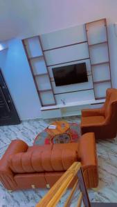 TV a/nebo společenská místnost v ubytování Ros Villa Apartment