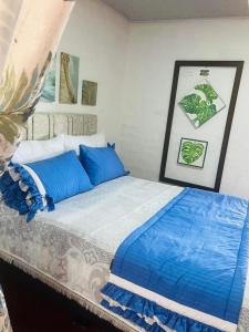 Ένα ή περισσότερα κρεβάτια σε δωμάτιο στο Hospedaje Finca Talulos +6 φωτογραφίες