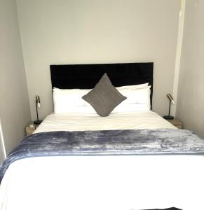 Postel nebo postele na pokoji v ubytování Stay-Tiah Grey, Durban + 11 fotografií