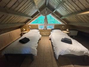 Postel nebo postele na pokoji v ubytování Oak Valley 15