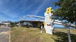 a large statue of a woman with a flower on it at Valley 3F - Mid Century Modern Kawaramachi Apt in Takamatsu