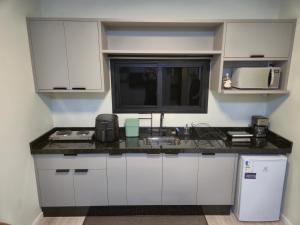 Η κουζίνα ή μικρή κουζίνα στο Casa Container Natureza +17 φωτογραφίες