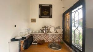 Η κουζίνα ή μικρή κουζίνα στο Villa Éden