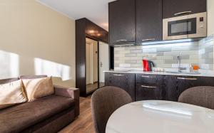 Η κουζίνα ή μικρή κουζίνα στο Stylish Stay at Loft 1 in New Gudauri