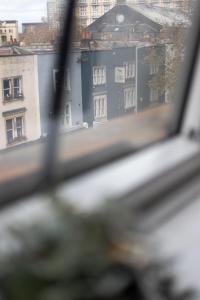 a view of a building from a window at Stylish, Spacious 1 Bedroom Apartment, central in Bristol