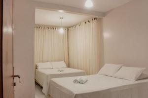 En eller flere senge i et værelse på Casa Chayenne + 23 billeder