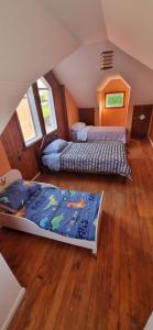 Ένα ή περισσότερα κρεβάτια σε δωμάτιο στο Casa en el centro de llanquihue, hasta 10 personas