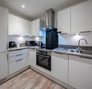 Una cocina o cocineta en Urban Luxury Flat Centre