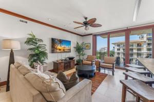 a living room with a couch and a table at Beach Villas at Ko Olina 8th floor Ocean View in Kapolei